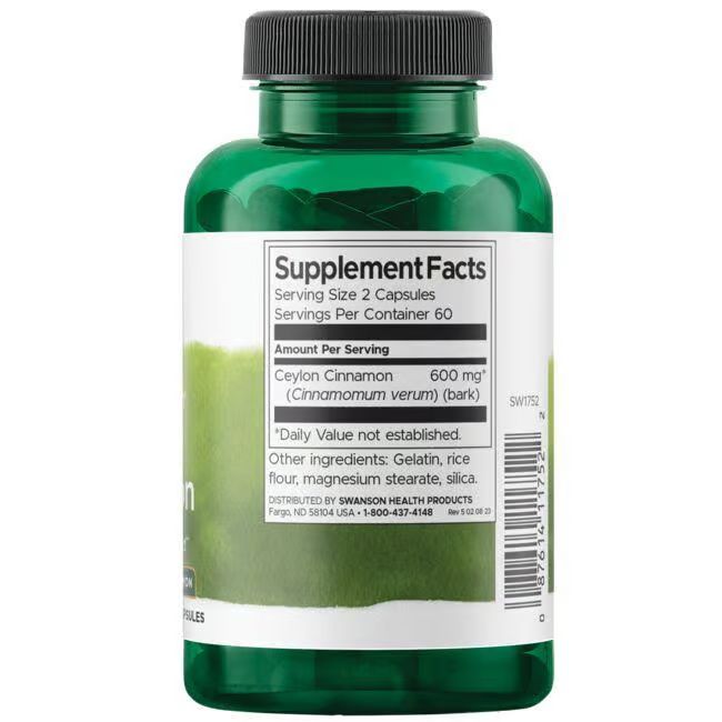 Retro di un flacone verde. Etichetta con informazioni nutrizionali: Cannella di Ceylon, 600 mg per 2 capsule. Altri ingredienti.
