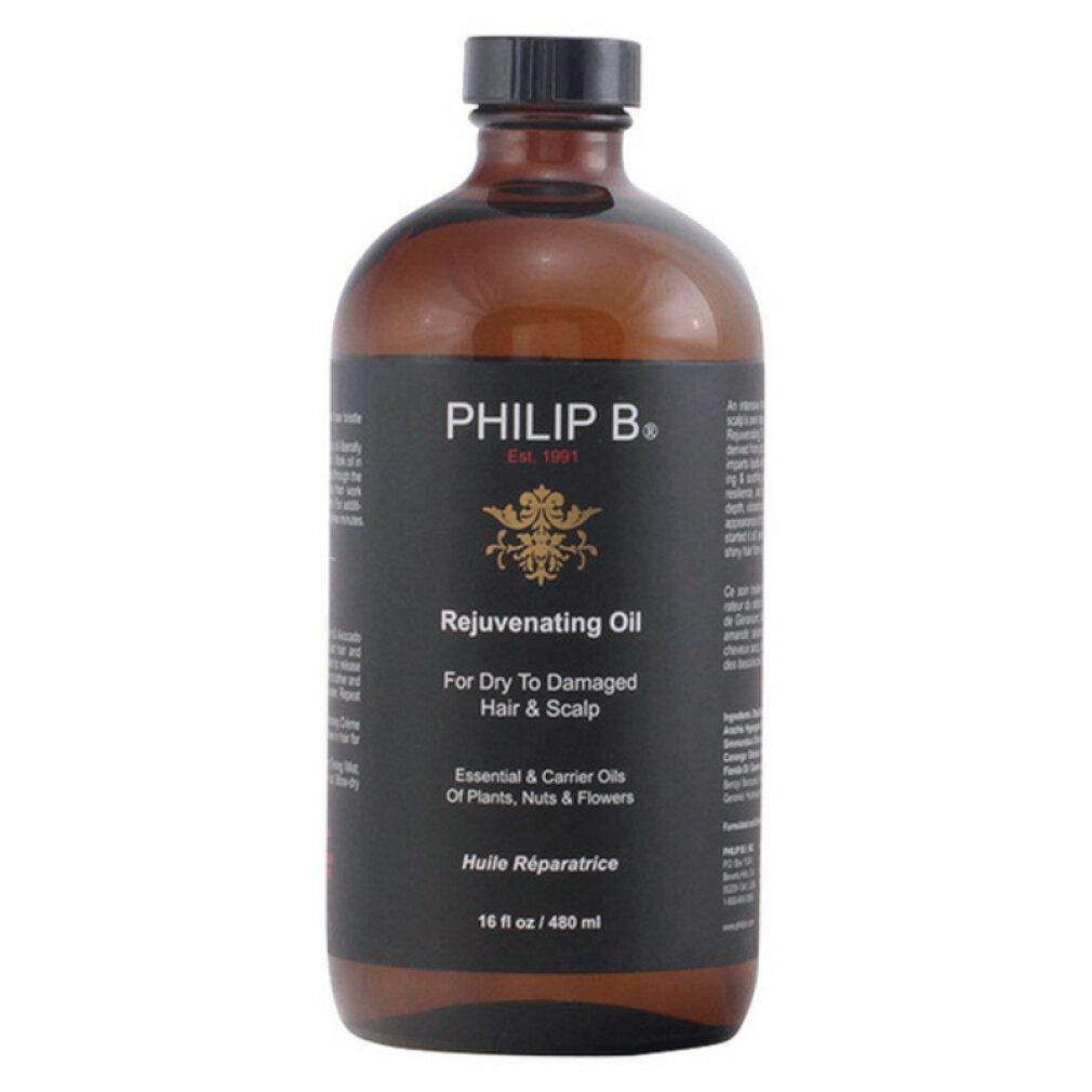 Flacone di vetro marrone con tappo nero. Scritta: Philip B. Rejuvenating Oil. Per capelli secchi e danneggiati e cuoio capelluto. 16 fl oz / 480 ml.