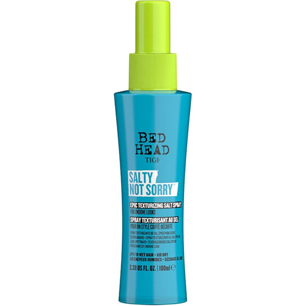 Flacone spray blu turchese con erogatore verde. Scritta: Bed Head Tigi Salty Not Sorry Epic Texturizing Salt Spray.