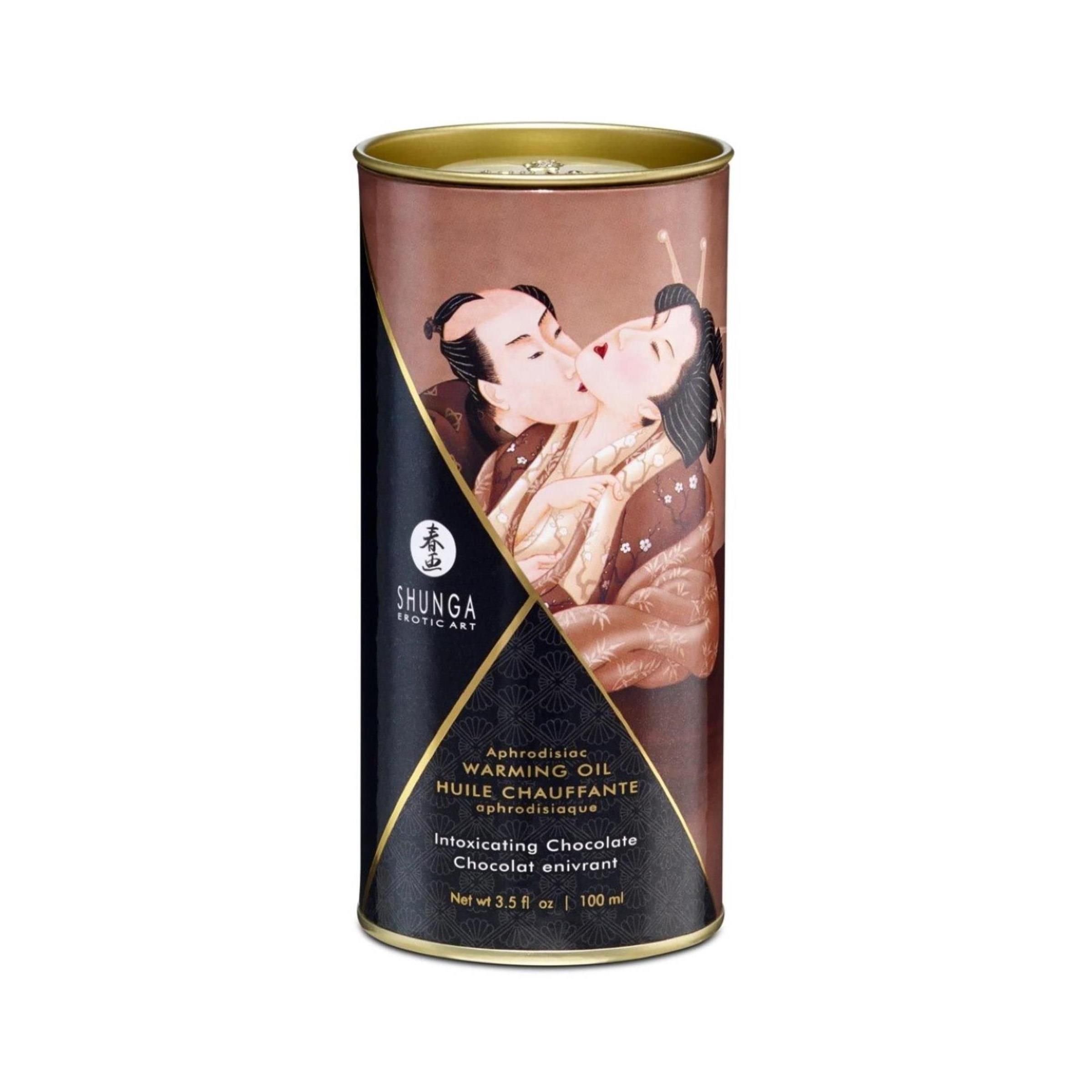 Confezione cilindrica con immagine di coppia. Testo: Shunga, Warming Oil, Cioccolato inebriante.