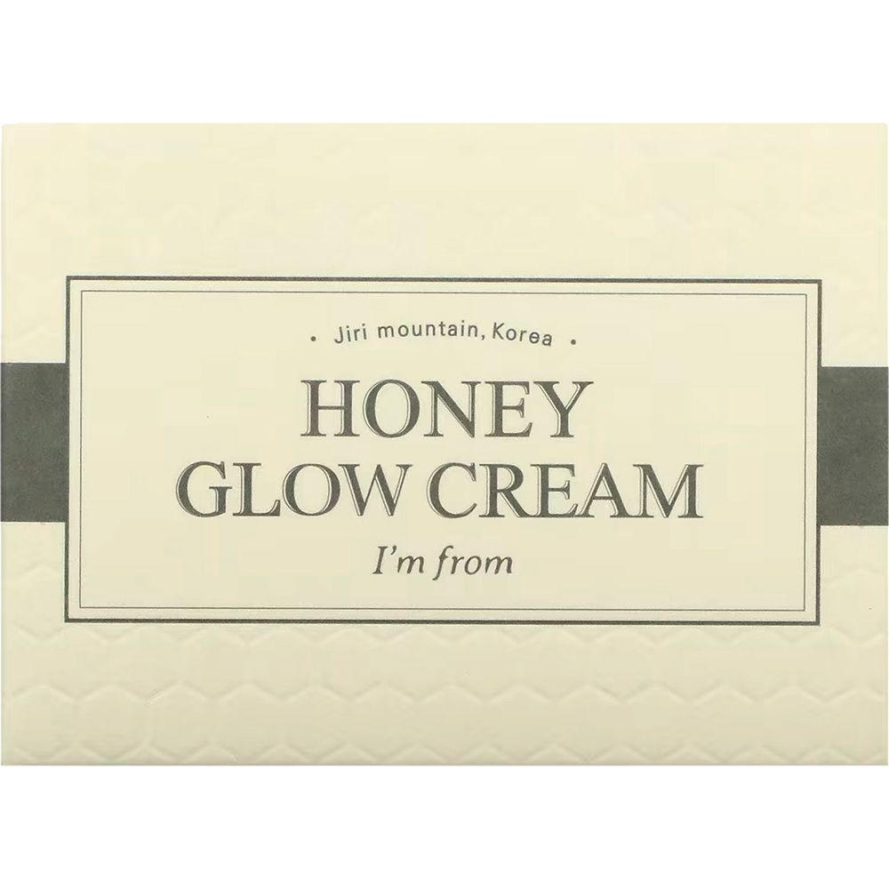 Confezione con scritta: HONEY GLOW CREAM, I'm from. Forma rettangolare. Sfondo beige.