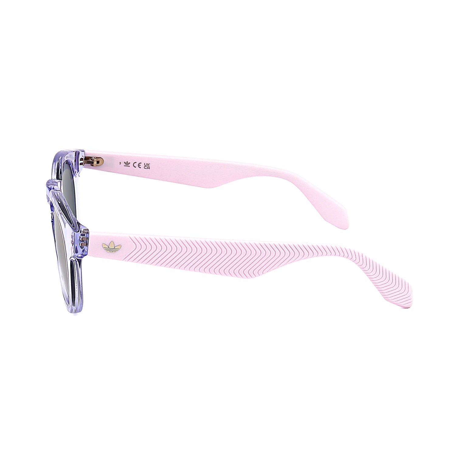Occhiali da sole viola trasparenti con aste rosa e motivo a zig-zag. Logo Adidas sull'asta.