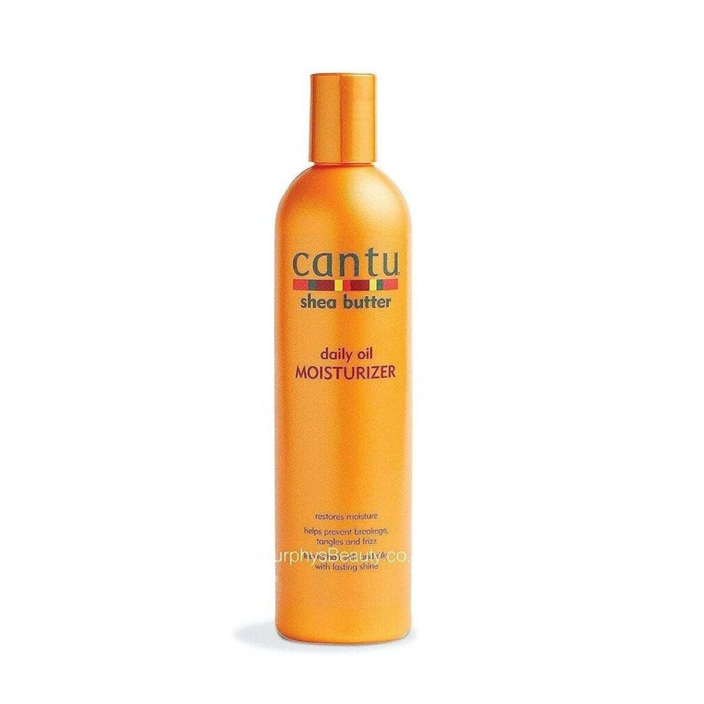 Flacone arancione Cantu Shea Butter Daily Oil Moisturizer con tappo a ribalta. 13 FL OZ / 384 ml.