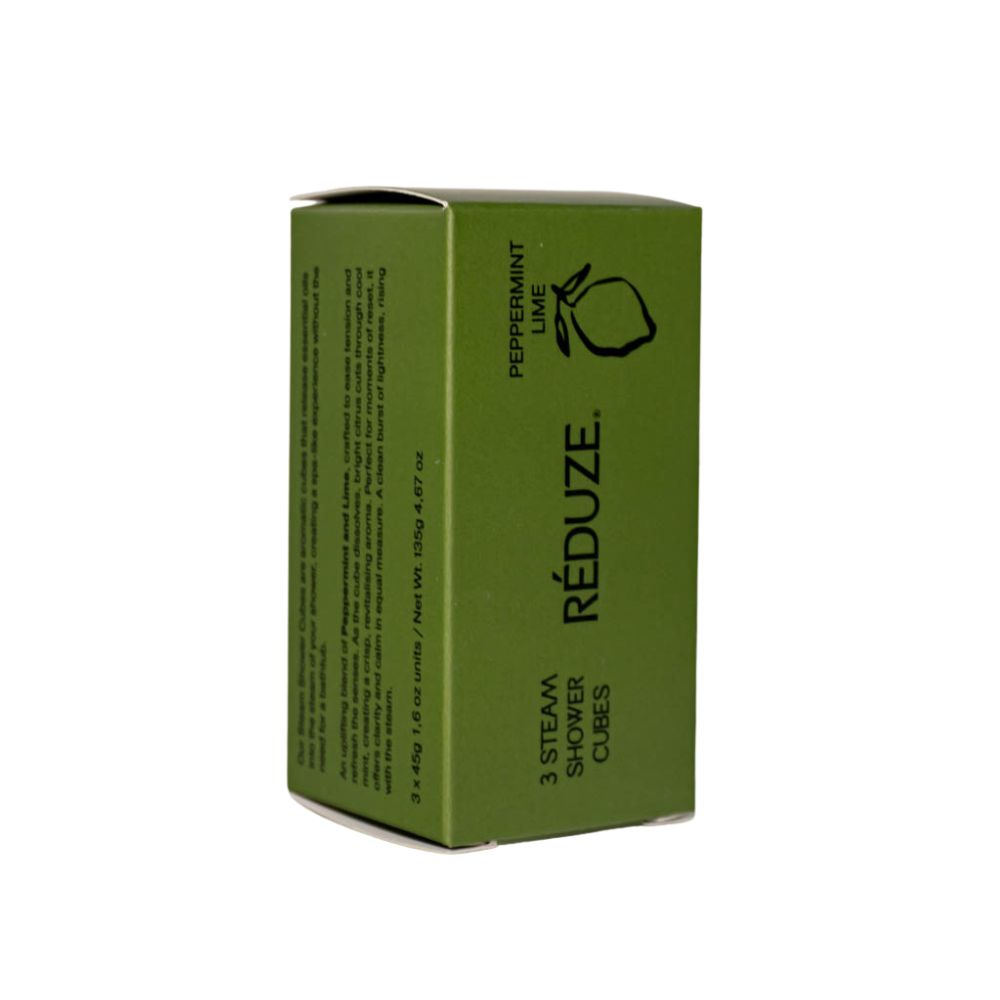 Scatola verde con scritta RÉDUZE, menta piperita e lime. 3 Steam Shower Cubes.