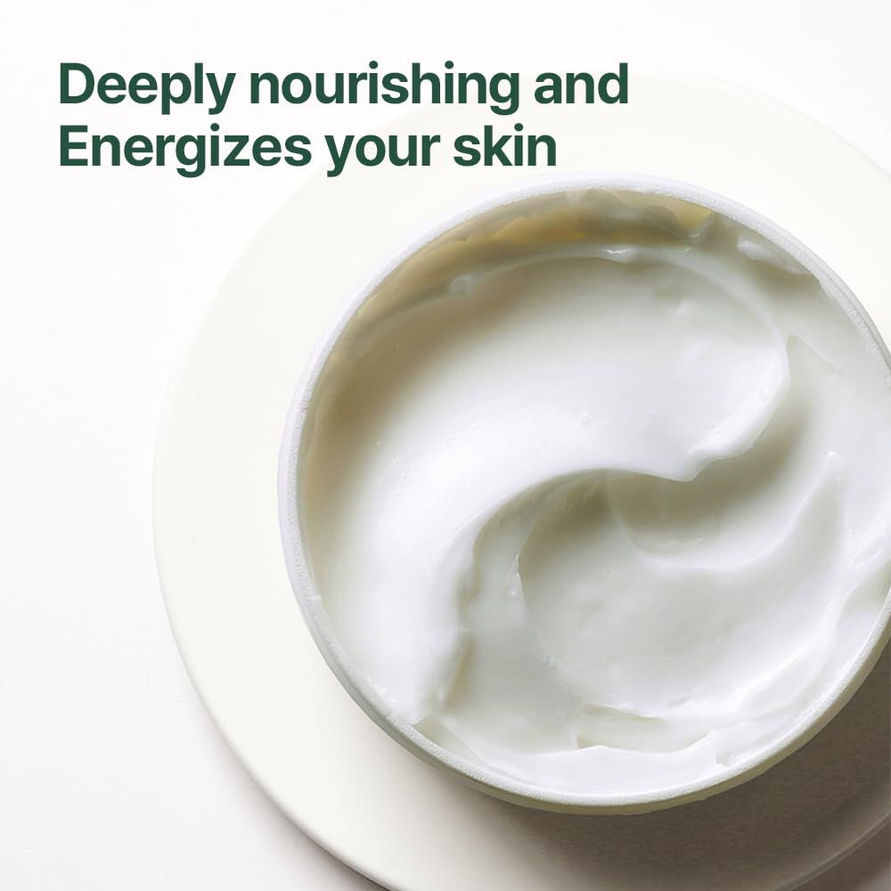 Crema in un vasetto. Vista dall'alto. Testo: Deeply nourishing and Energizes your skin.