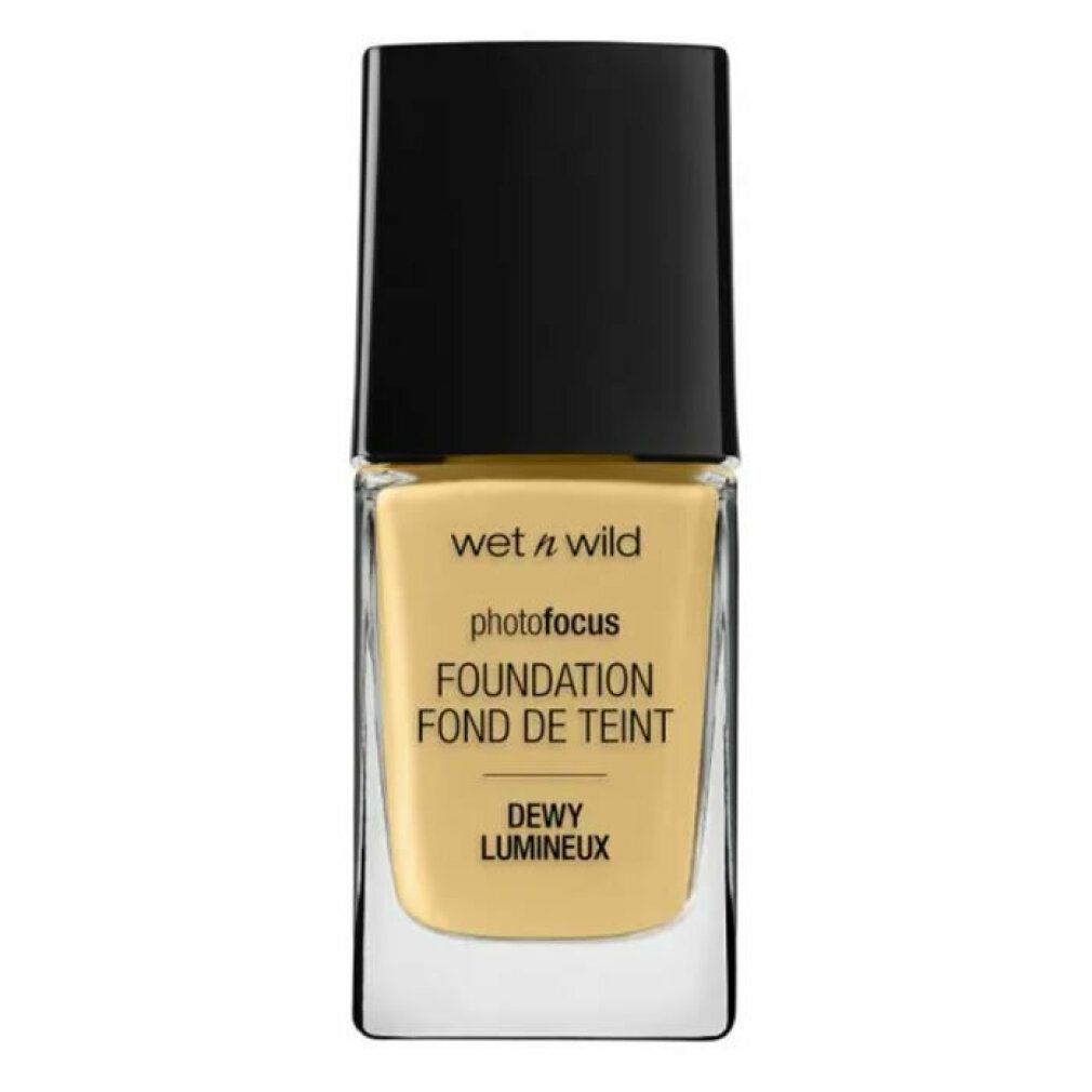 Fondotinta liquido Wet n Wild Photo Focus in flacone di vetro con tappo nero. Scritta: Dewy Lumineux.