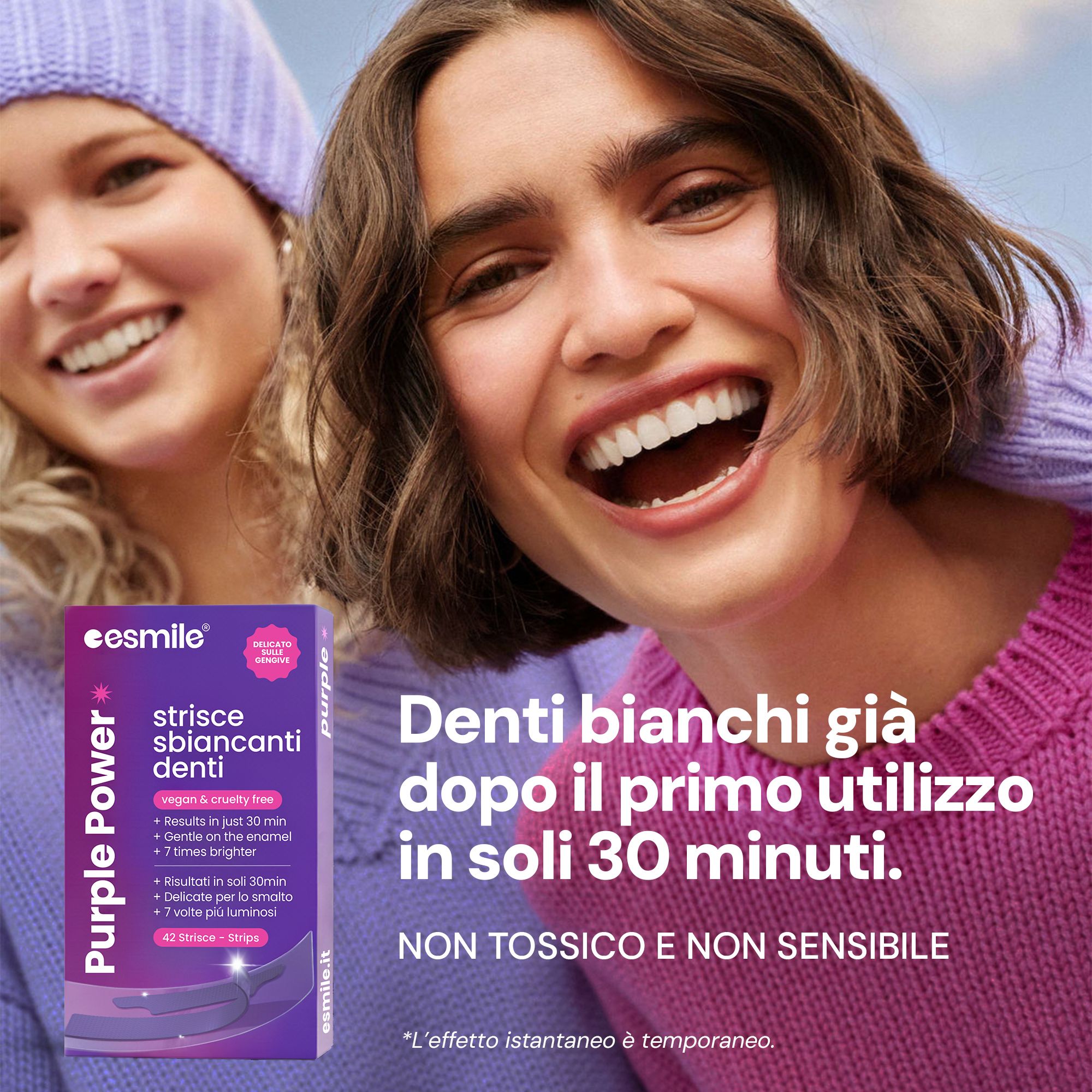 Due donne sorridenti. Una tiene una scatola viola con scritto «esmile Purple Power». Testo: «Denti bianchi dopo il primo utilizzo in 30 minuti».