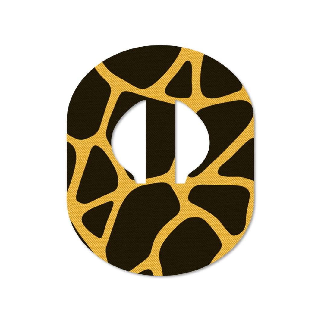 Cerotto ovale con motivo marrone e giallo. Con ritaglio centrale. Materiale strutturato.
