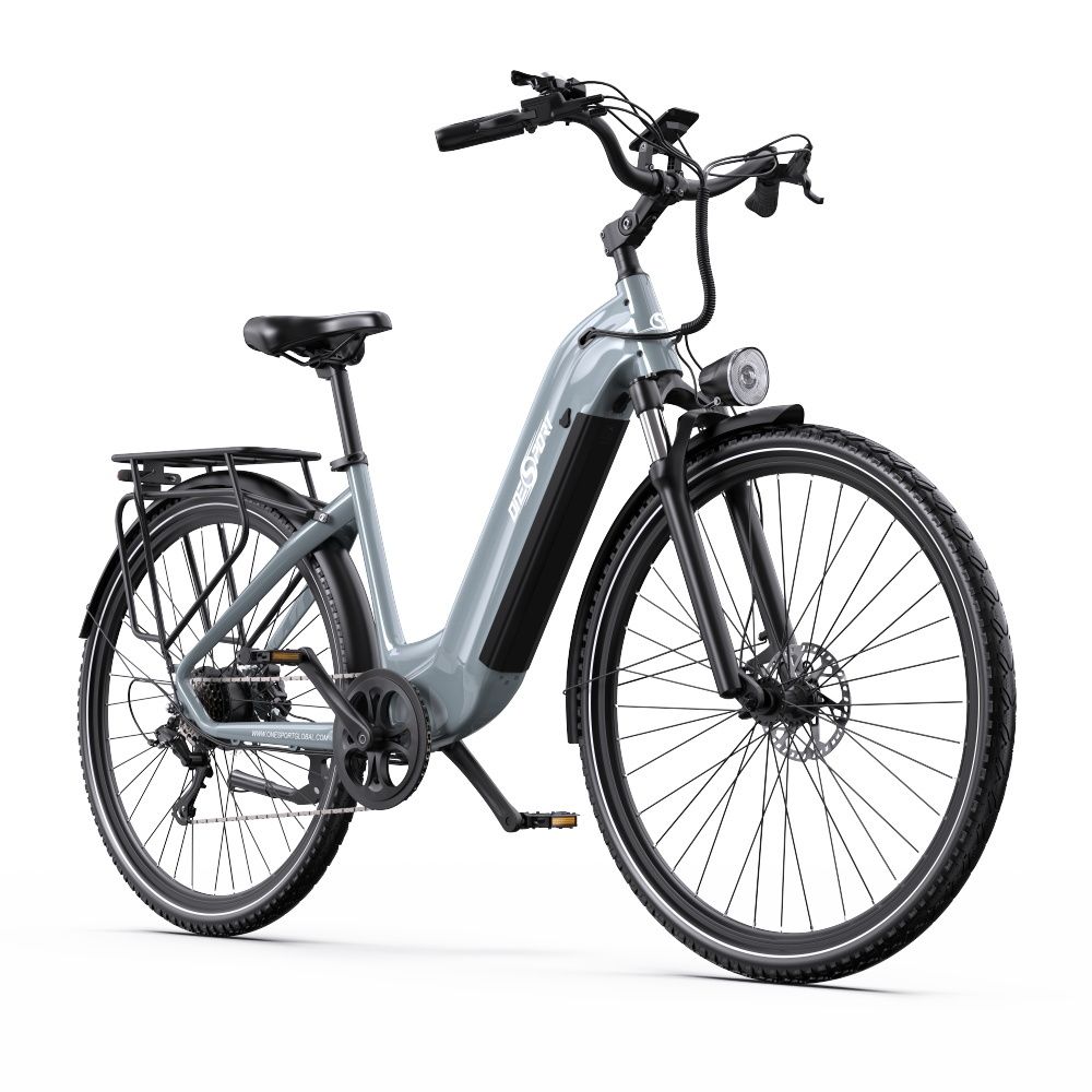 E-bike grigia con pneumatici neri e portapacchi. Faro e batteria visibili.