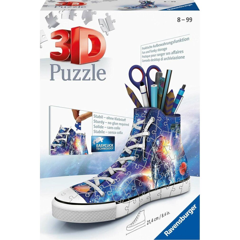 Puzzle 3D Sneaker Galaxy, a forma di scarpa, riempito di penne. Confezione con immagine del prodotto e logo. Dimensioni: 21,4 cm.