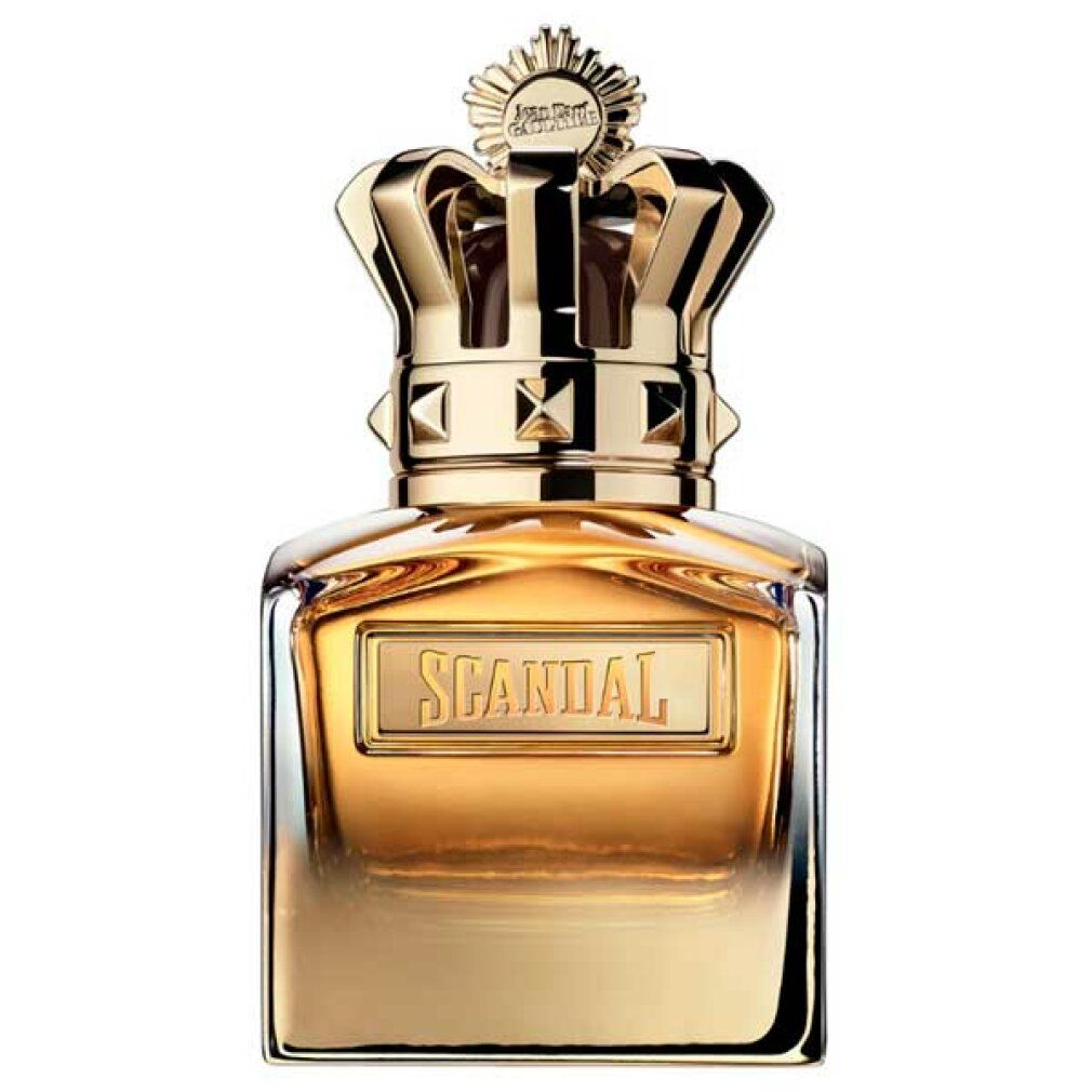 Flacone di profumo con corona dorata. Scritto: Scandal. Vetro dorato.