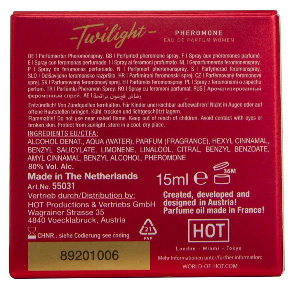 Confezione di profumo rossa con testo. Contiene informazioni sugli ingredienti, il produttore e le avvertenze. 15ml.