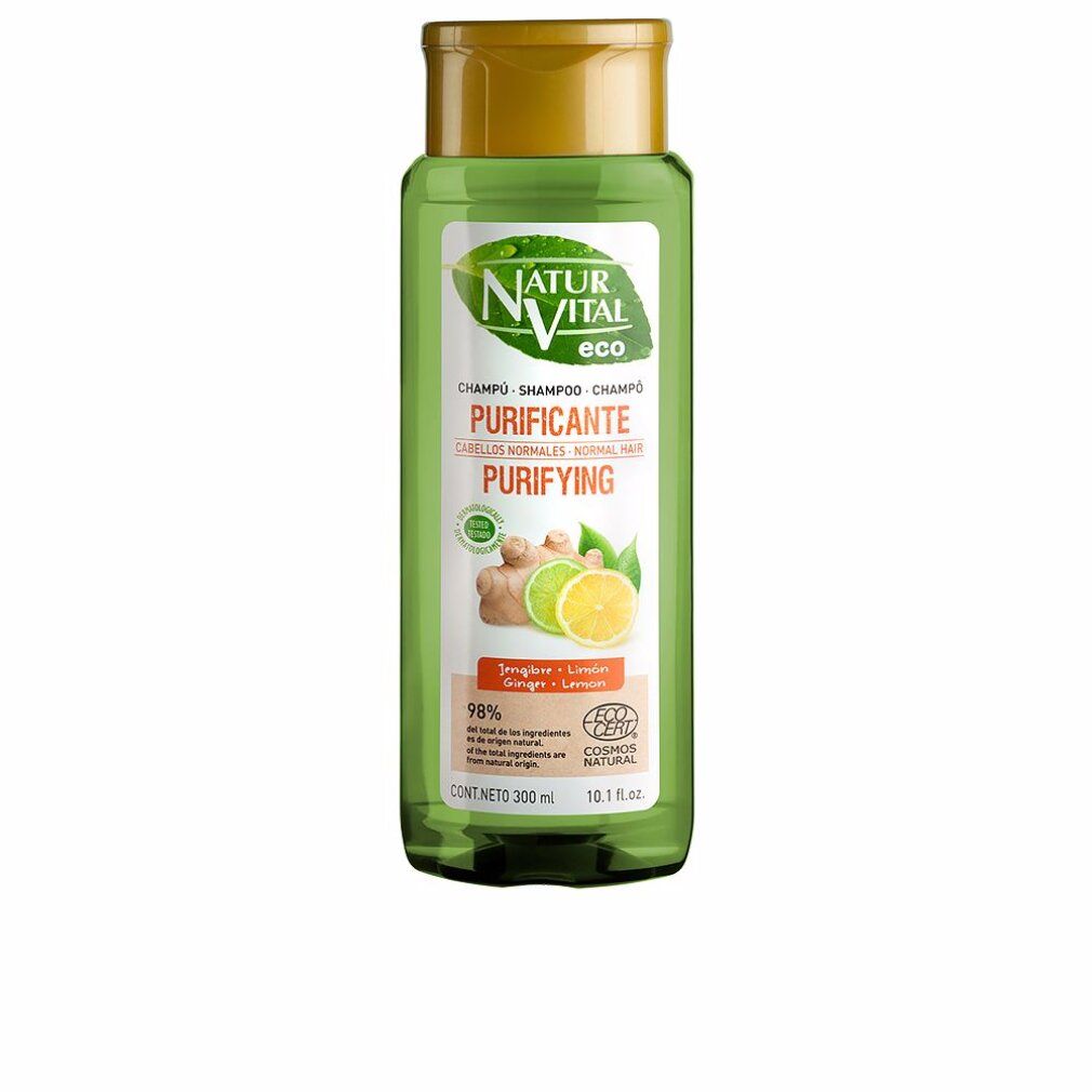 Flacone di shampoo verde con tappo dorato. Etichetta con nome del prodotto, illustrazione zenzero e limone. Testo: Purificante, 98% ingredienti naturali.