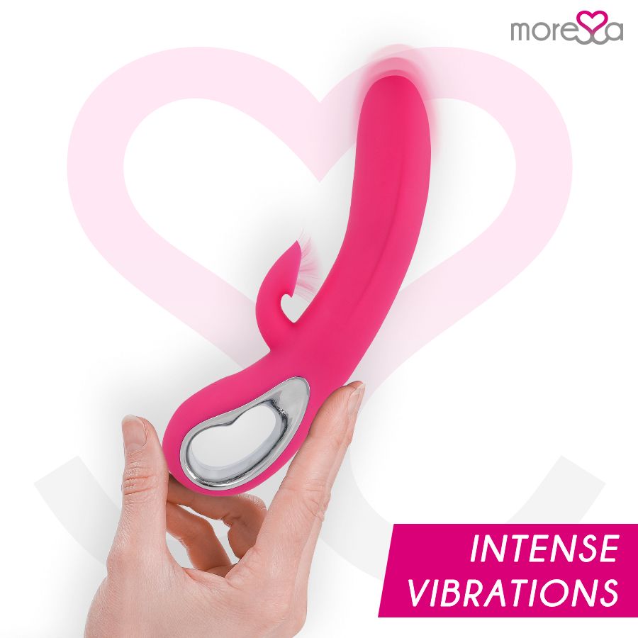 Lovetoy rosa in mano, sfondo a cuore e testo 'INTENSE VIBRATIONS'.