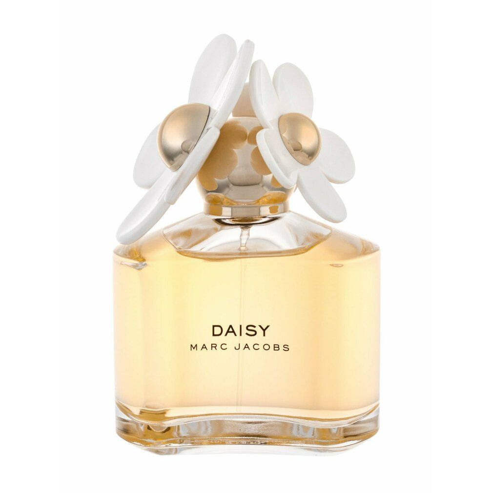 Flacone profumo Daisy Marc Jacobs con fiore bianco. Scritta: DAISY MARC JACOBS. Flacone trasparente.