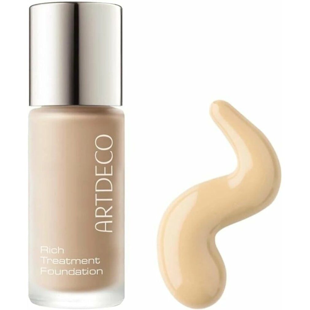 Flacone Artdeco Rich Treatment Foundation e campione. Flacone con tappo argentato, scritta. Campione a forma di onda.