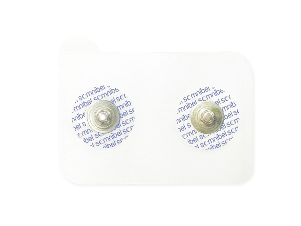 Due cerotti adesivi rotondi con bottone metallico su supporto bianco. Stampa con logo del marchio.