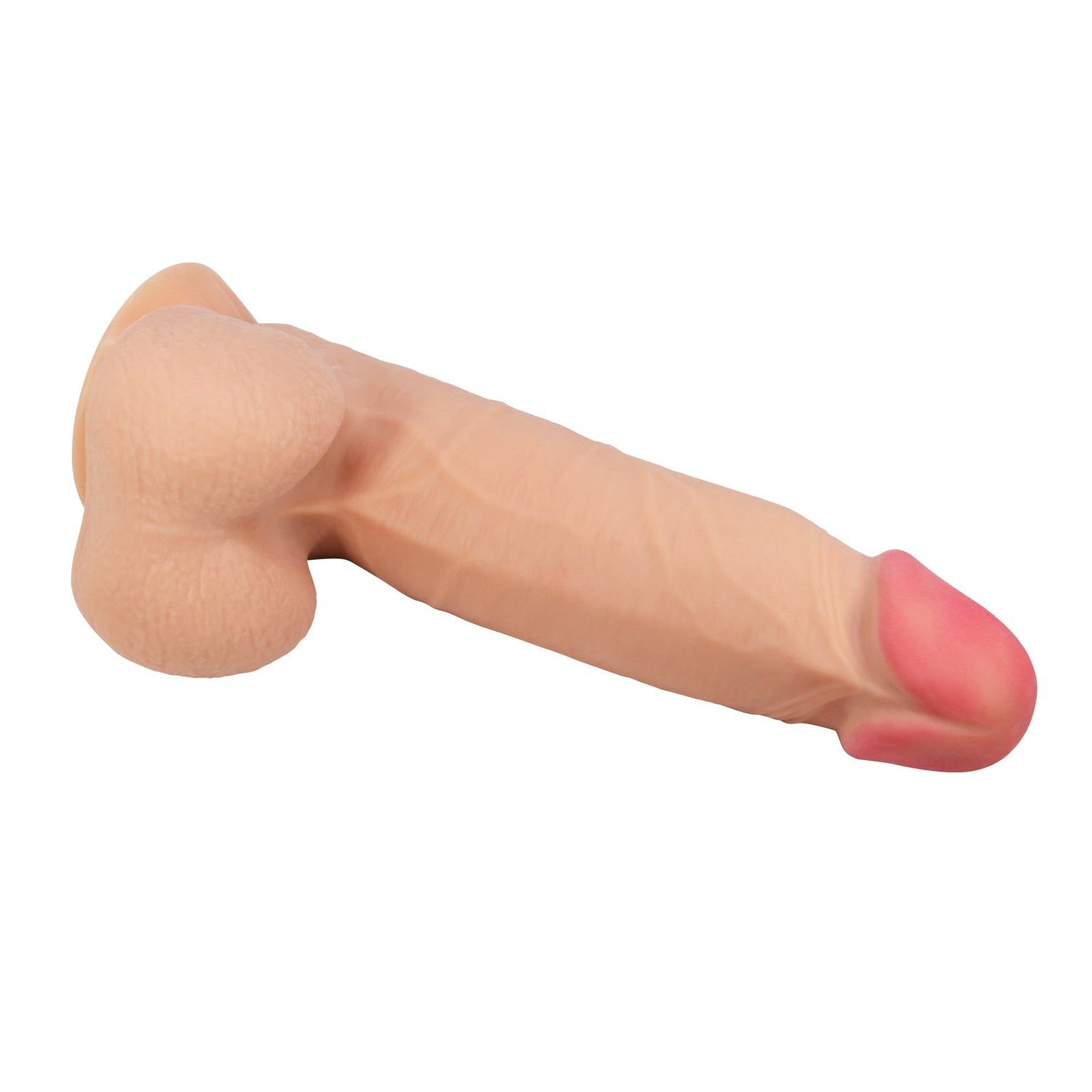 Dildo beige con punta rosa. Forma venata e dettagliata. Appoggiato su una superficie.