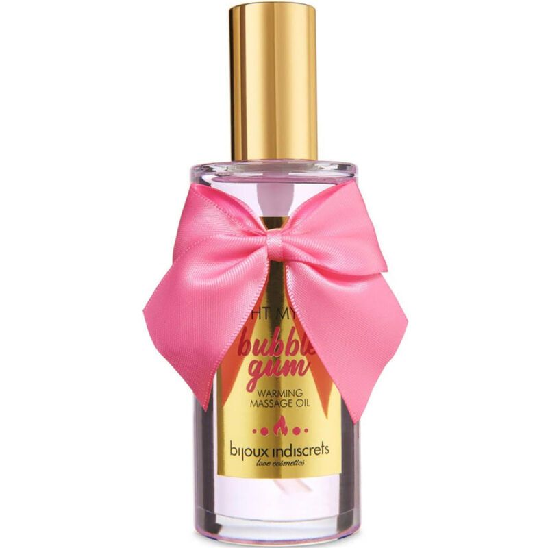 Olio da massaggio in bottiglia con fiocco rosa. Etichetta dorata con "Bubble Gum" e "Bijoux Indiscrets".