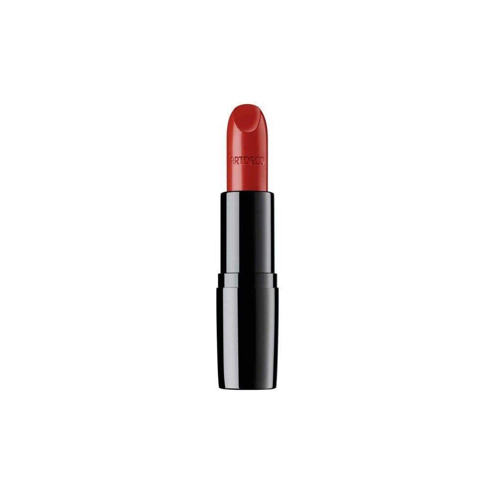 Rossetto rosso, parzialmente estratto dal suo involucro. Astuccio nero con rossetto rosso. "ARTDECO" è scritto sul rossetto.