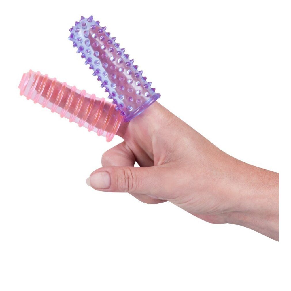 Due dita su una mano. Un dito rosa e un dito viola con borchie.