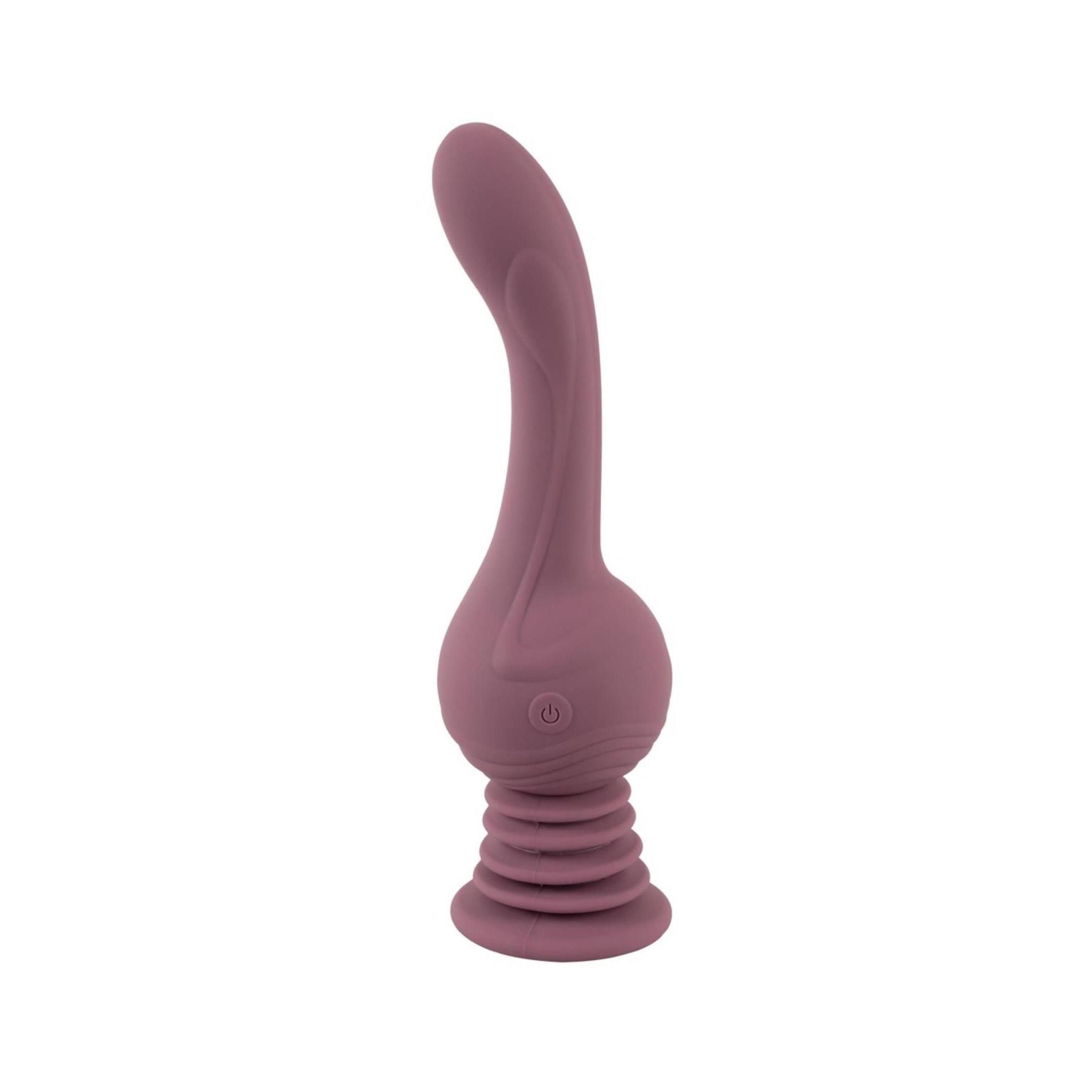 Vibratore lilla con base scanalata e forma curva. Orientamento verticale, su sfondo bianco.