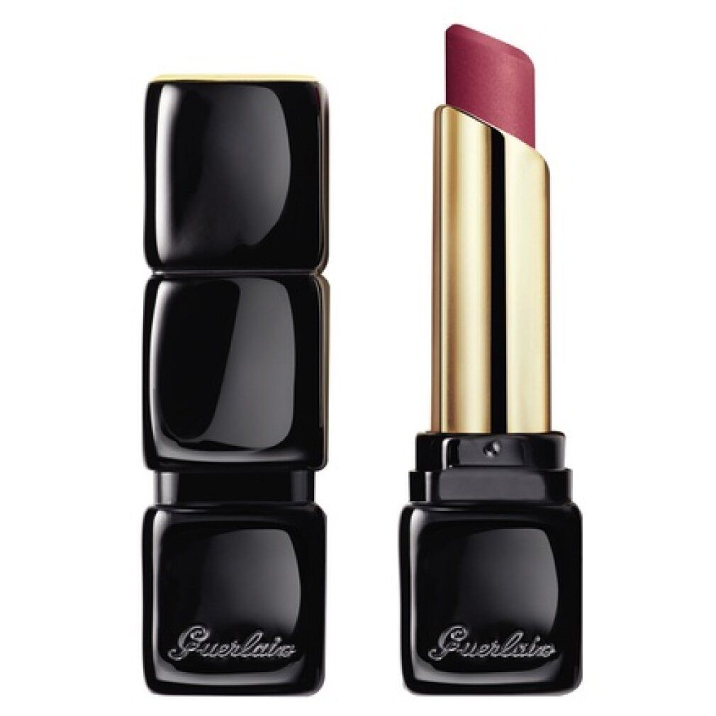 Rossetto rosa con custodia nera quadrata e astuccio dorato. Il rossetto è aperto.