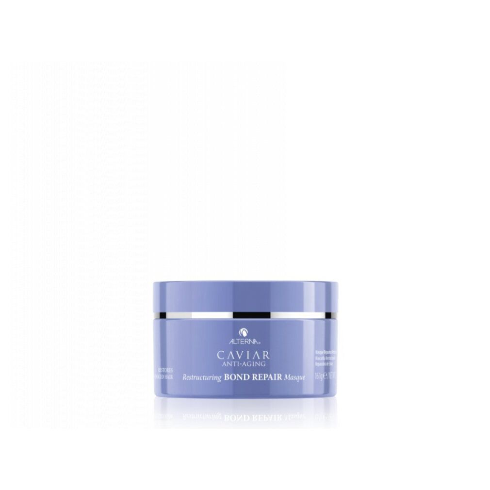 Vasetto di crema lilla chiaro con coperchio argentato. Scritta: Caviar Anti-Aging, Restructuring Bond Repair Masque.
