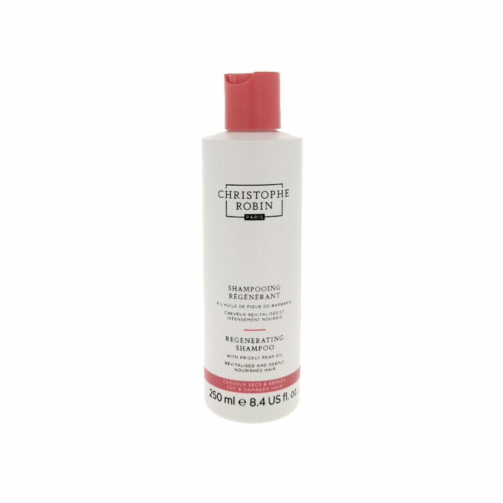 Flacone di shampoo bianco con tappo rosso. Testo: Christophe Robin, Shampooing Régénérant, Regenerating Shampoo. 250 ml.