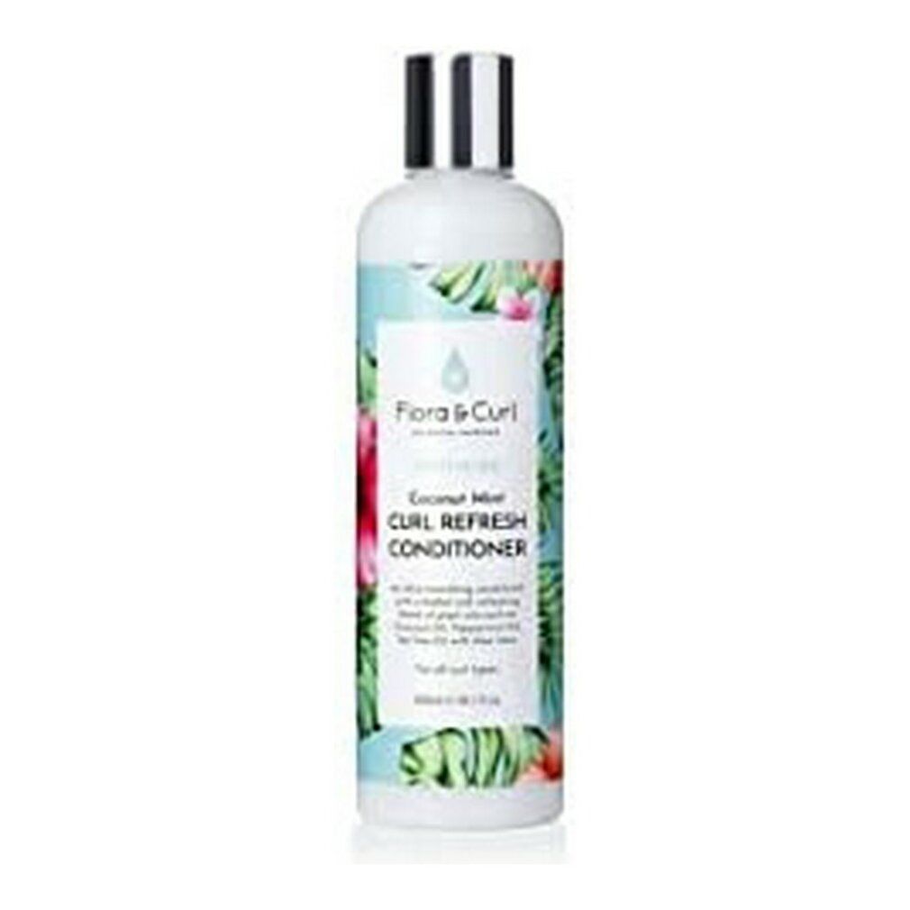 Flacone con etichetta. Scritta: Soothe Me Coconut Mint Curl Refresh Conditioner. Motivi floreali, foglie verdi e fiori rosa.