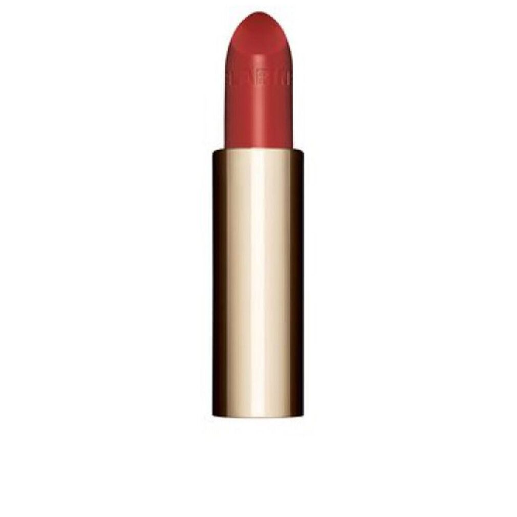 Rossetto rosso con astuccio dorato. La scritta "Clarins" è visibile sul rossetto.