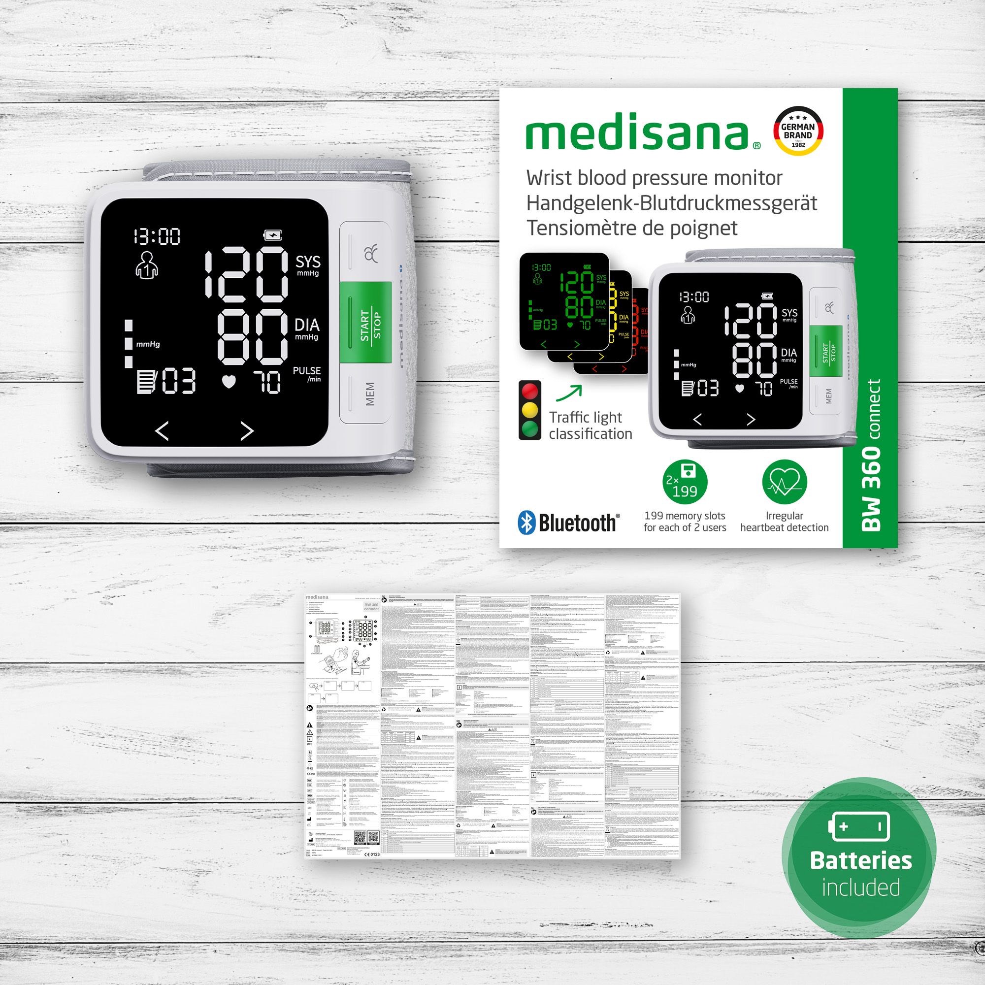 Confezione del misuratore di pressione medisana BW 360 connect con istruzioni e batterie.