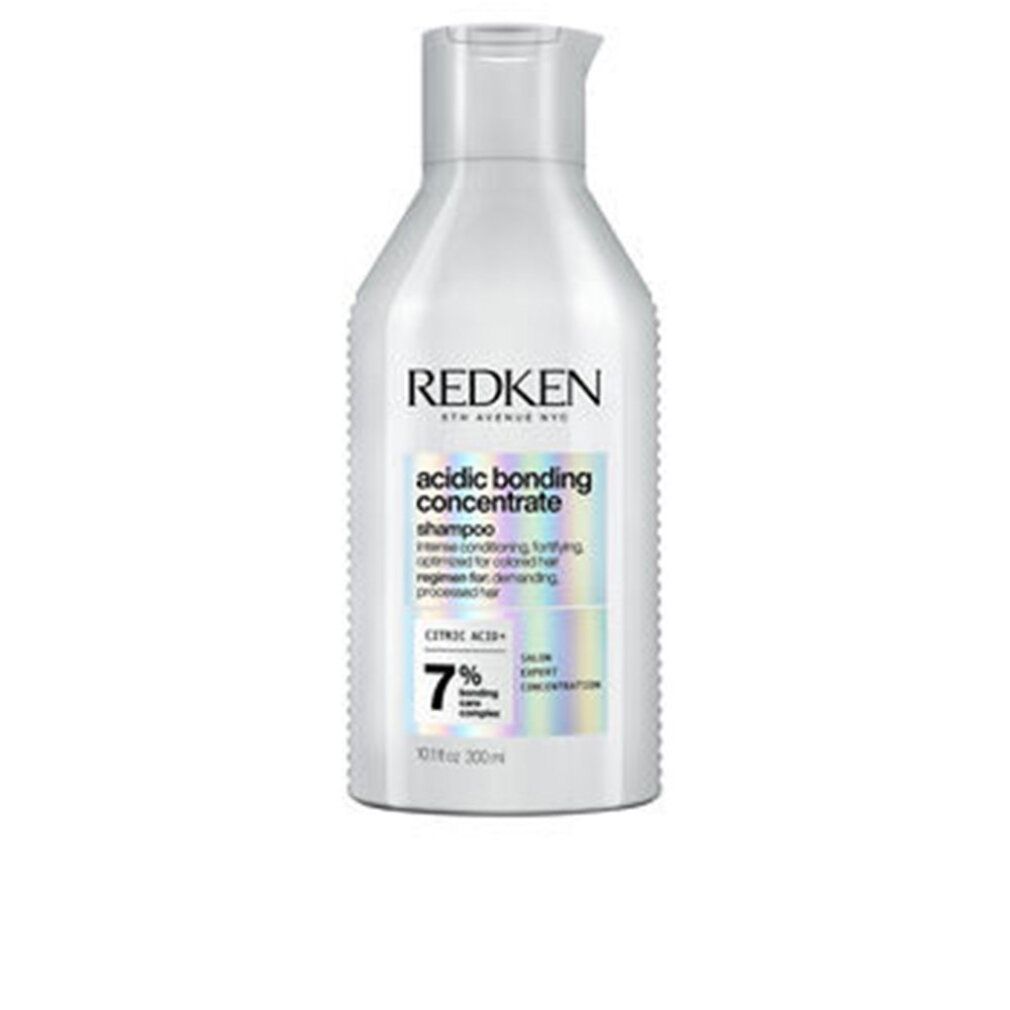 Flacone di shampoo bianco. Scritte: REDKEN, acidic bonding concentrate shampoo, 7% bonding care complex. 300 ml.