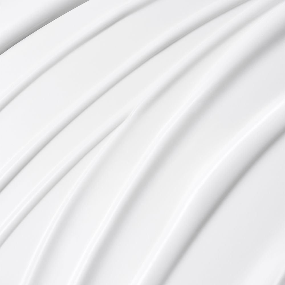 Texture astratta di crema bianca, disposta a onde.