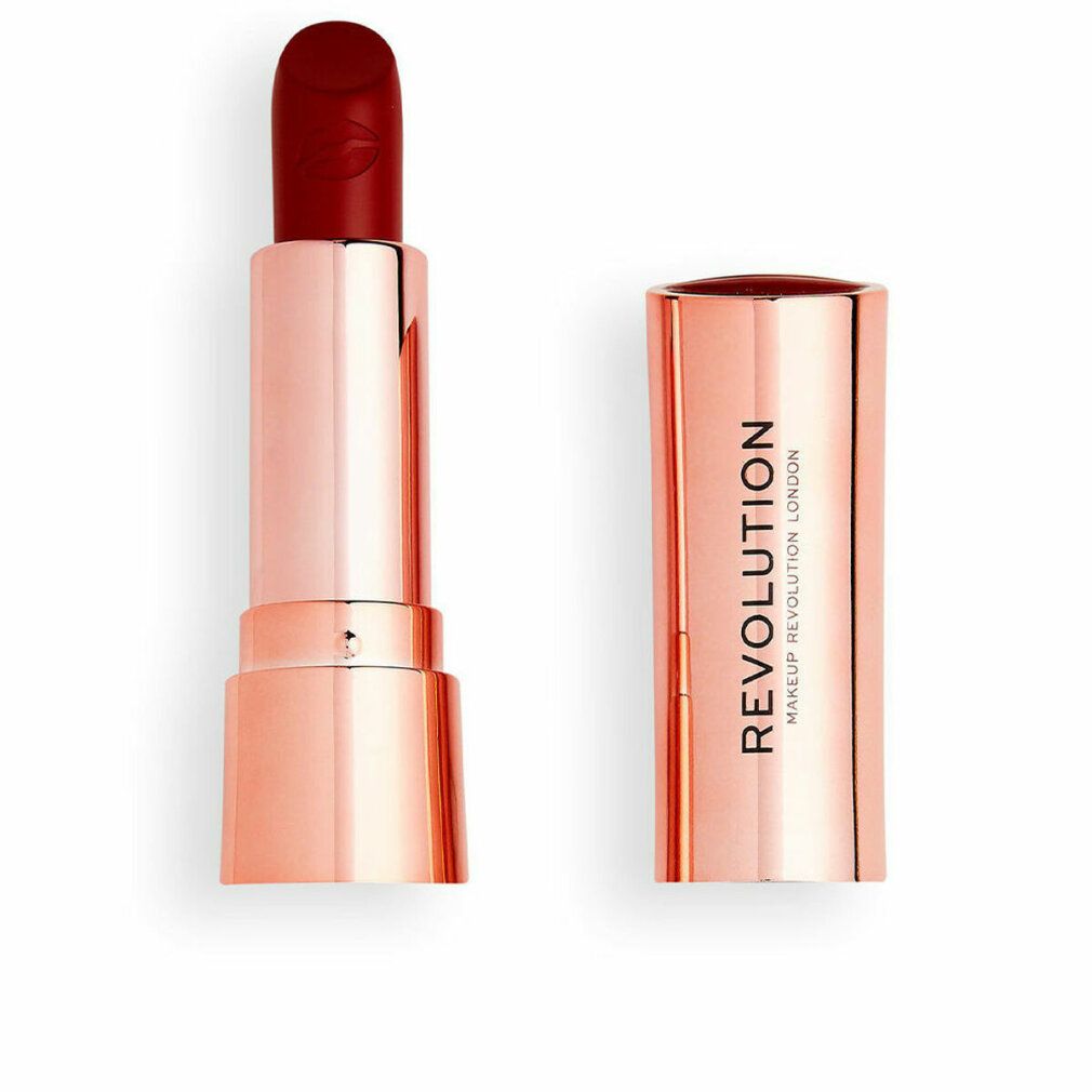 Rossetto rosso, aperto. Astuccio in metallo dorato. Scritta "REVOLUTION MAKEUP LONDON" sull'astuccio.