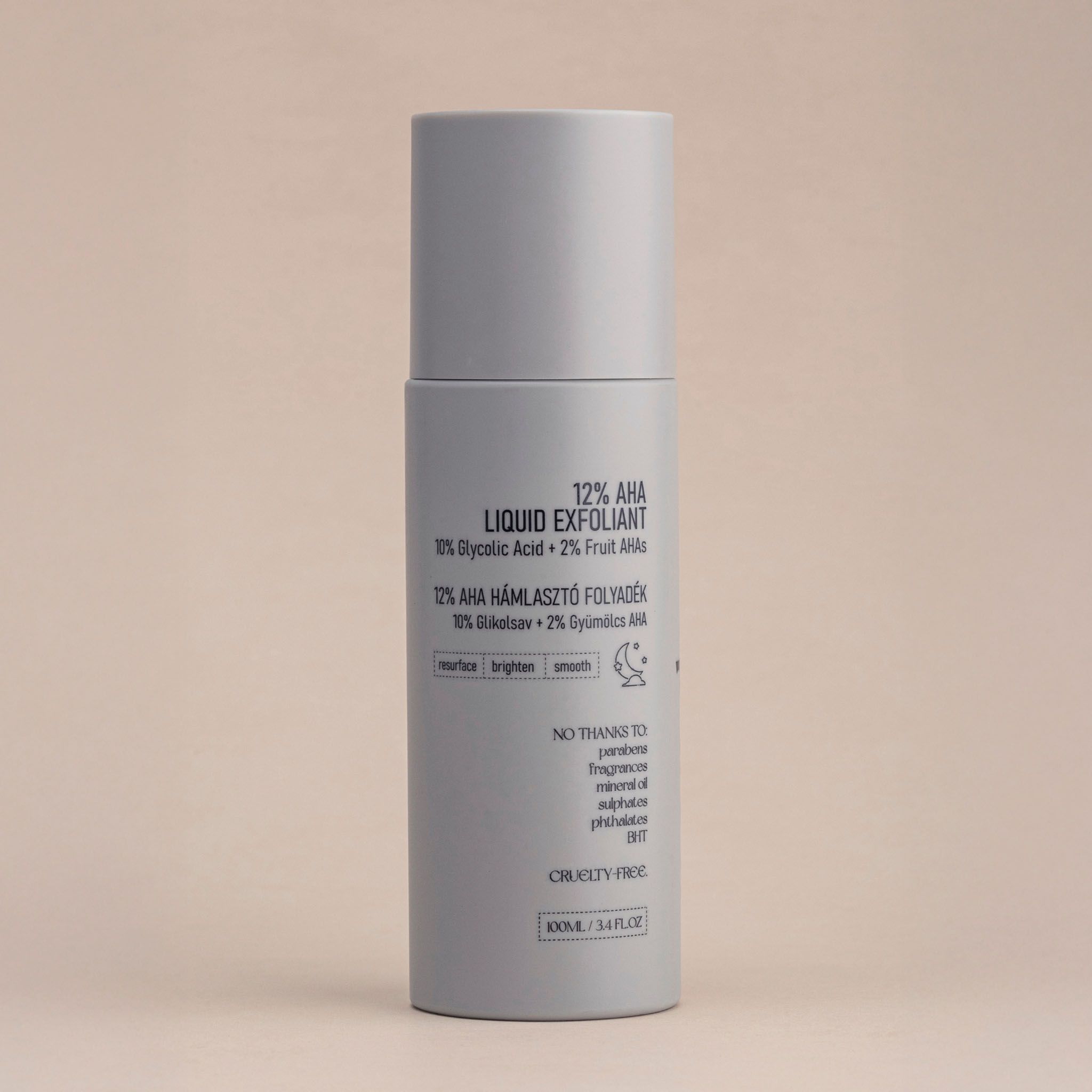 Flacone 12% AHA Liquid Exfoliant, con testo e simboli.
