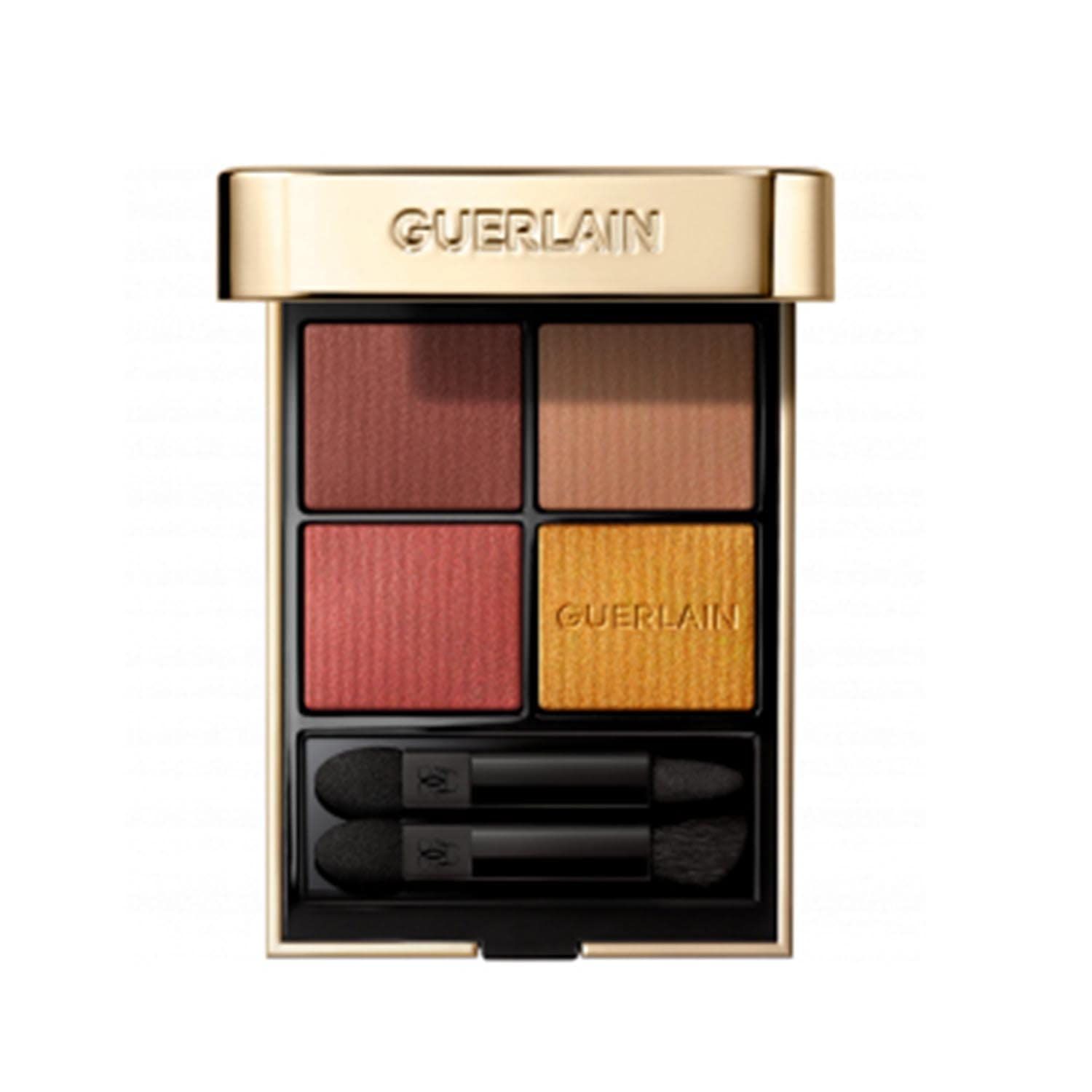 Palette ombretti dorata con quattro colori. Due applicatori. Marchio Guerlain.