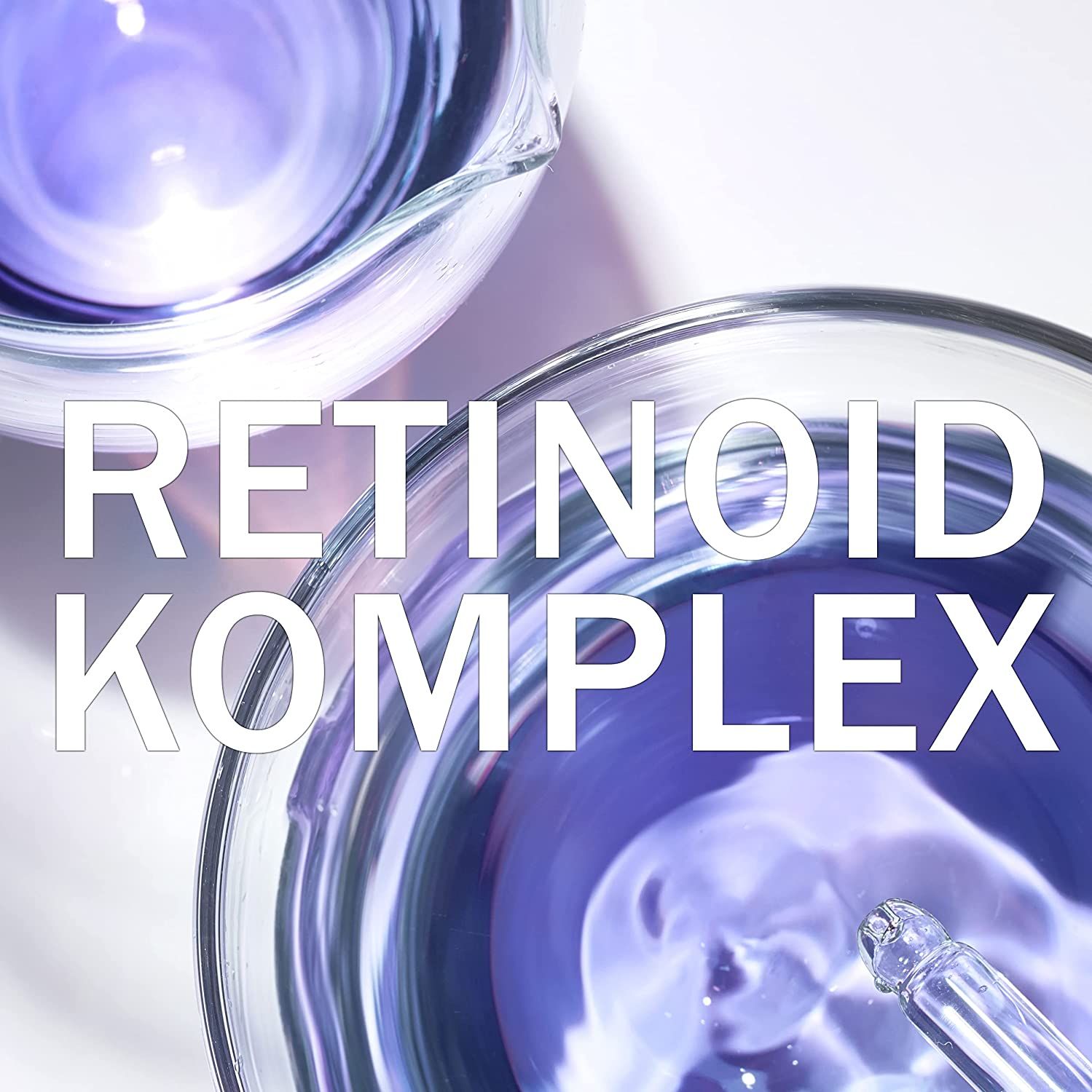 Due contenitori di vetro con liquido viola. Scritta: Retinoid Komplex. Pipetta visibile.