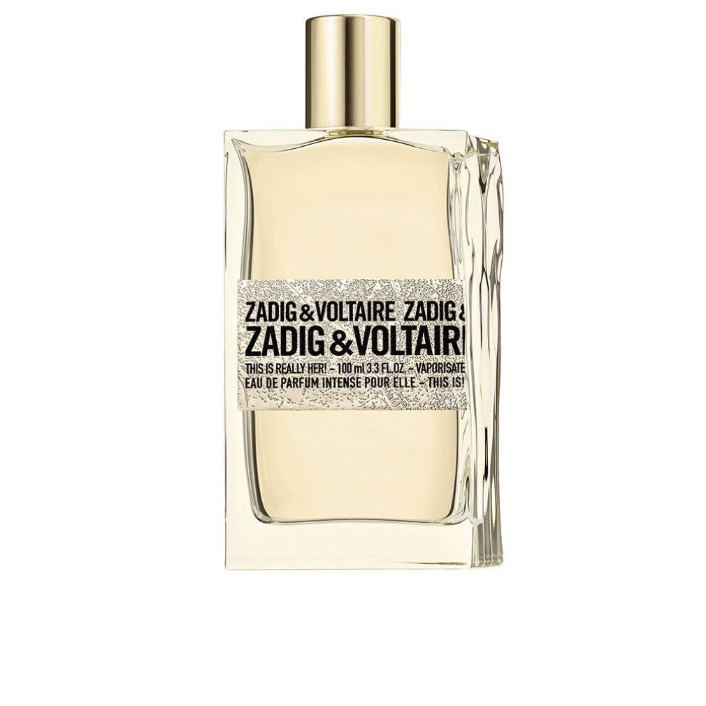 Flacone di profumo Zadig & Voltaire. Forma rettangolare, tappo dorato. Etichetta con nome e dettagli del prodotto.