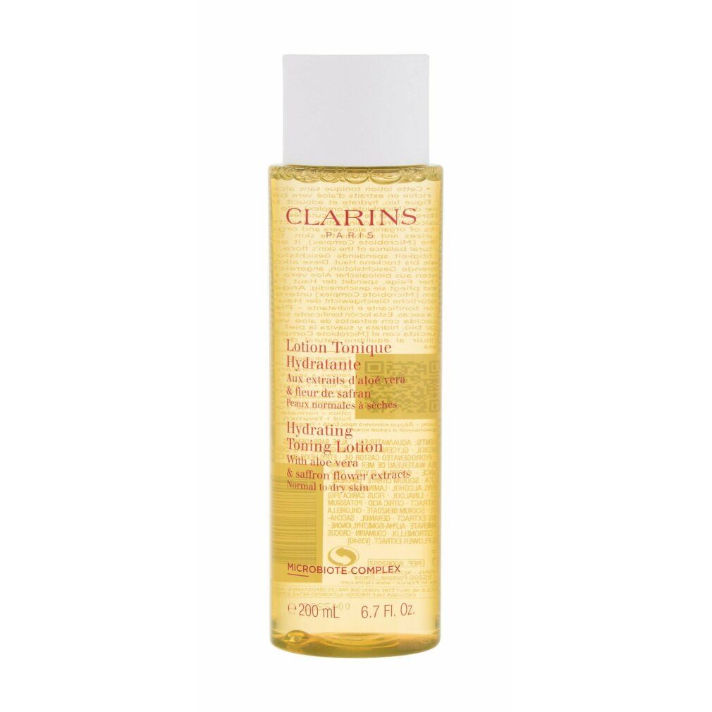 Clarins Lotion Tonique Hydratante. Liquido giallo in bottiglia con tappo bianco. Testo sull'etichetta.