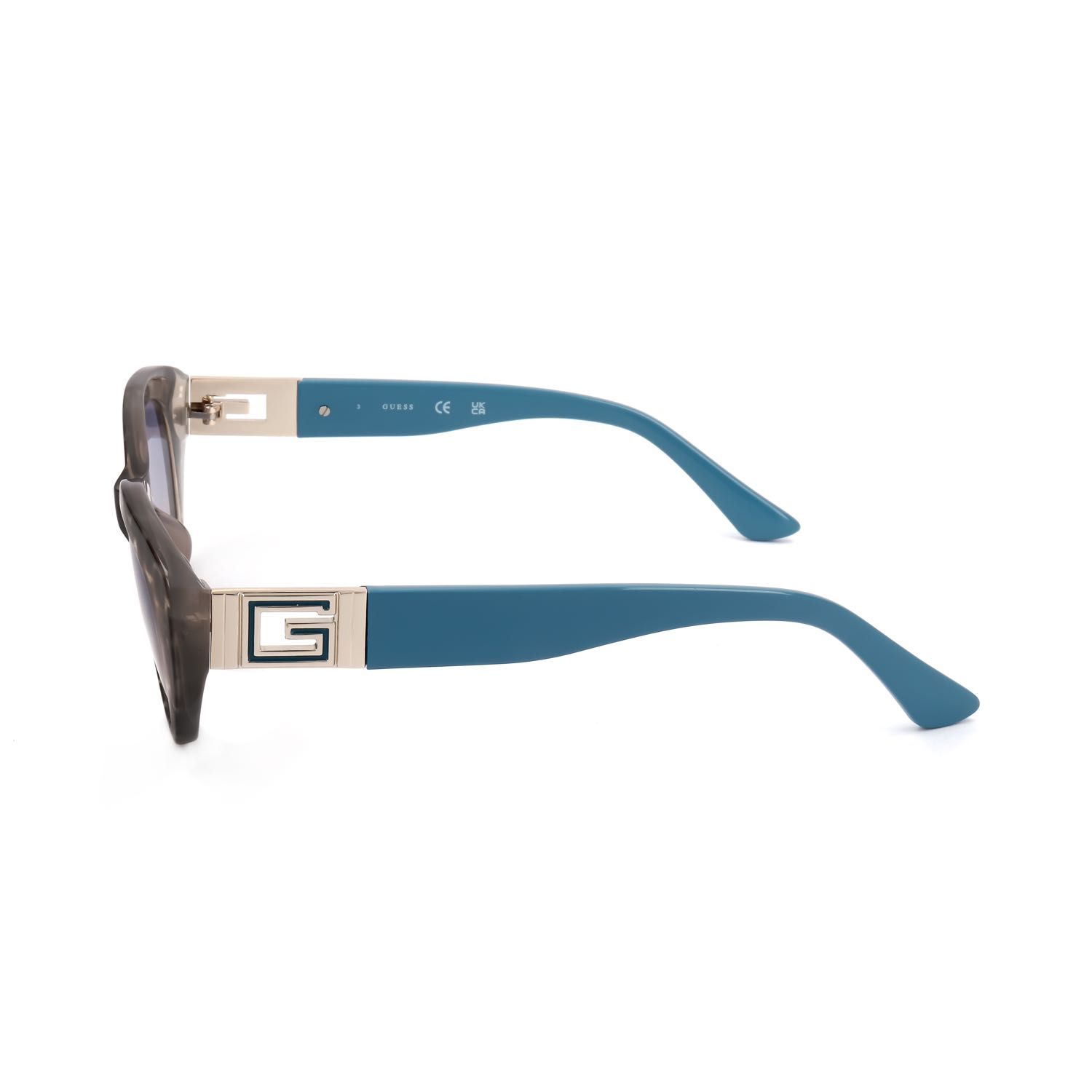 Occhiali con montatura marrone e aste blu, logo GUESS sull'asta.