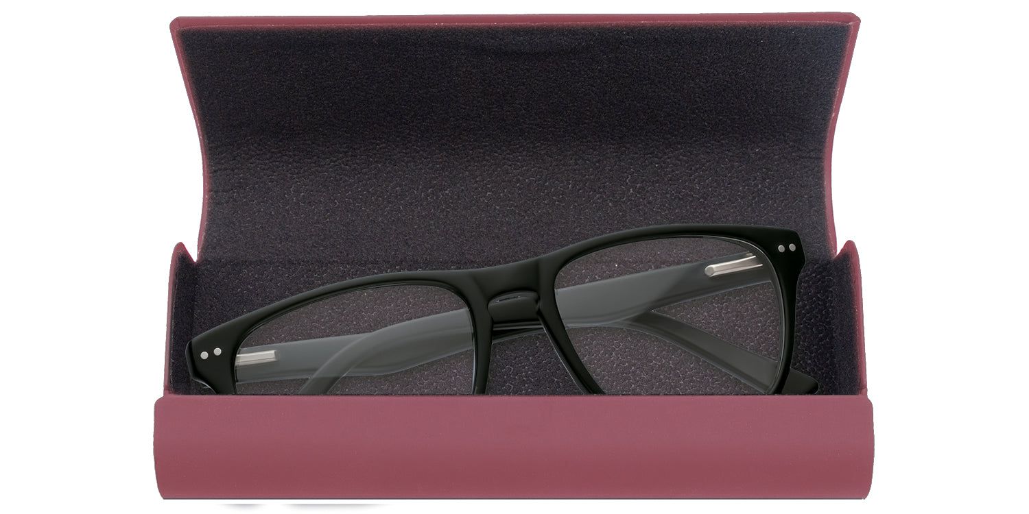 Astuccio rigido rosa aperto. Occhiali con montatura nera all'interno.