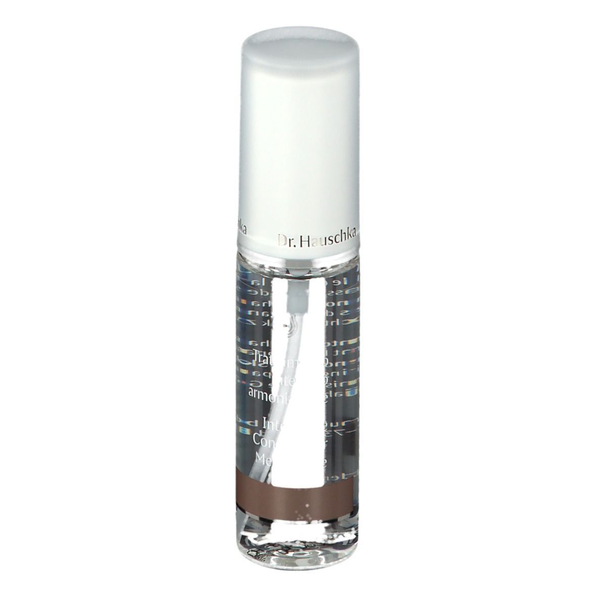 Flacone trasparente con vaporizzatore. Tappo bianco. Nome del prodotto e testo sul flacone. Striscia marrone in basso.