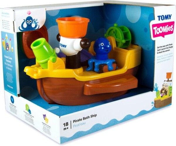Nave giocattolo da bagno con cannone, timone e personaggi. Confezionata in scatola. Logo TOMY visibile.