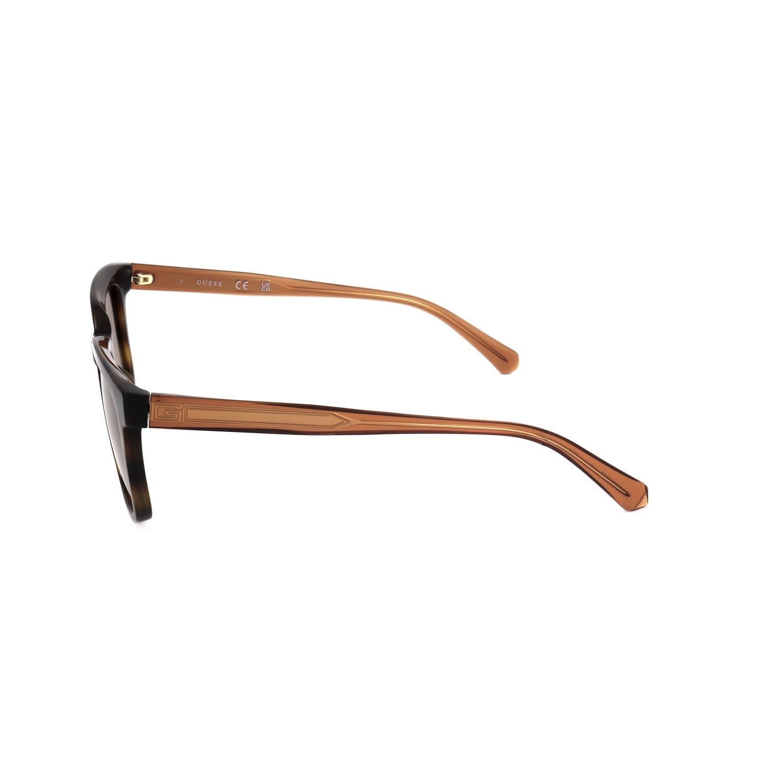Occhiali Guess marroni, vista laterale. Montatura marrone scuro con aste marrone chiaro.