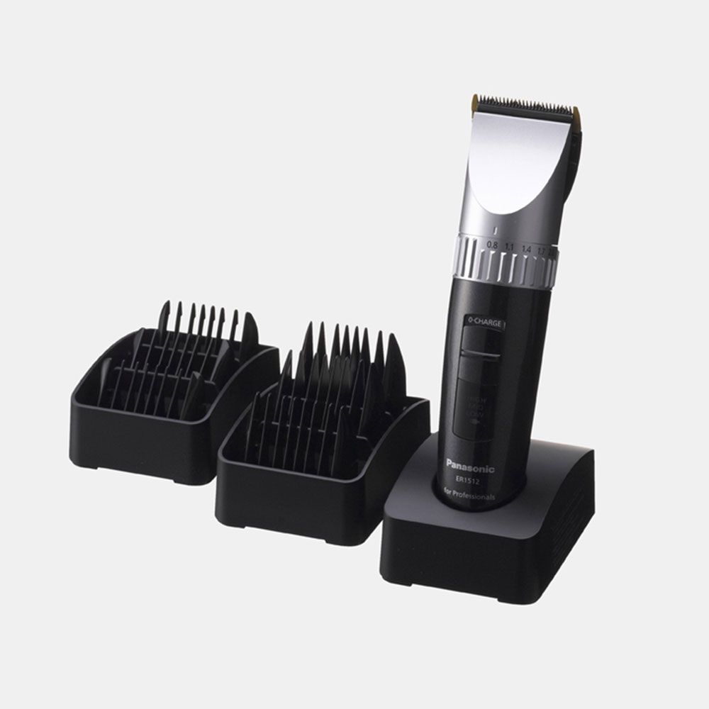 Tosatrice con base di ricarica e pettini. Pettini neri. Marca: Panasonic ER1512.