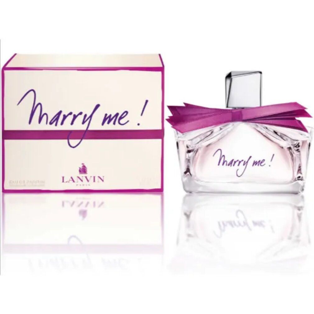 Flacone e confezione di profumo. Flacone con fiocco, scritta 'Marry me!'. Confezione con scritta e logo.