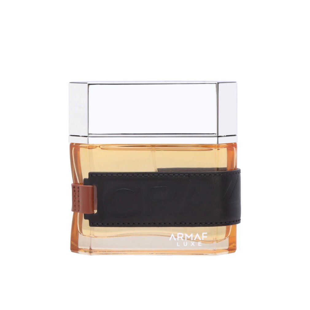 Flacone di profumo con cinturino in pelle nera. Scritta "CRAZE".