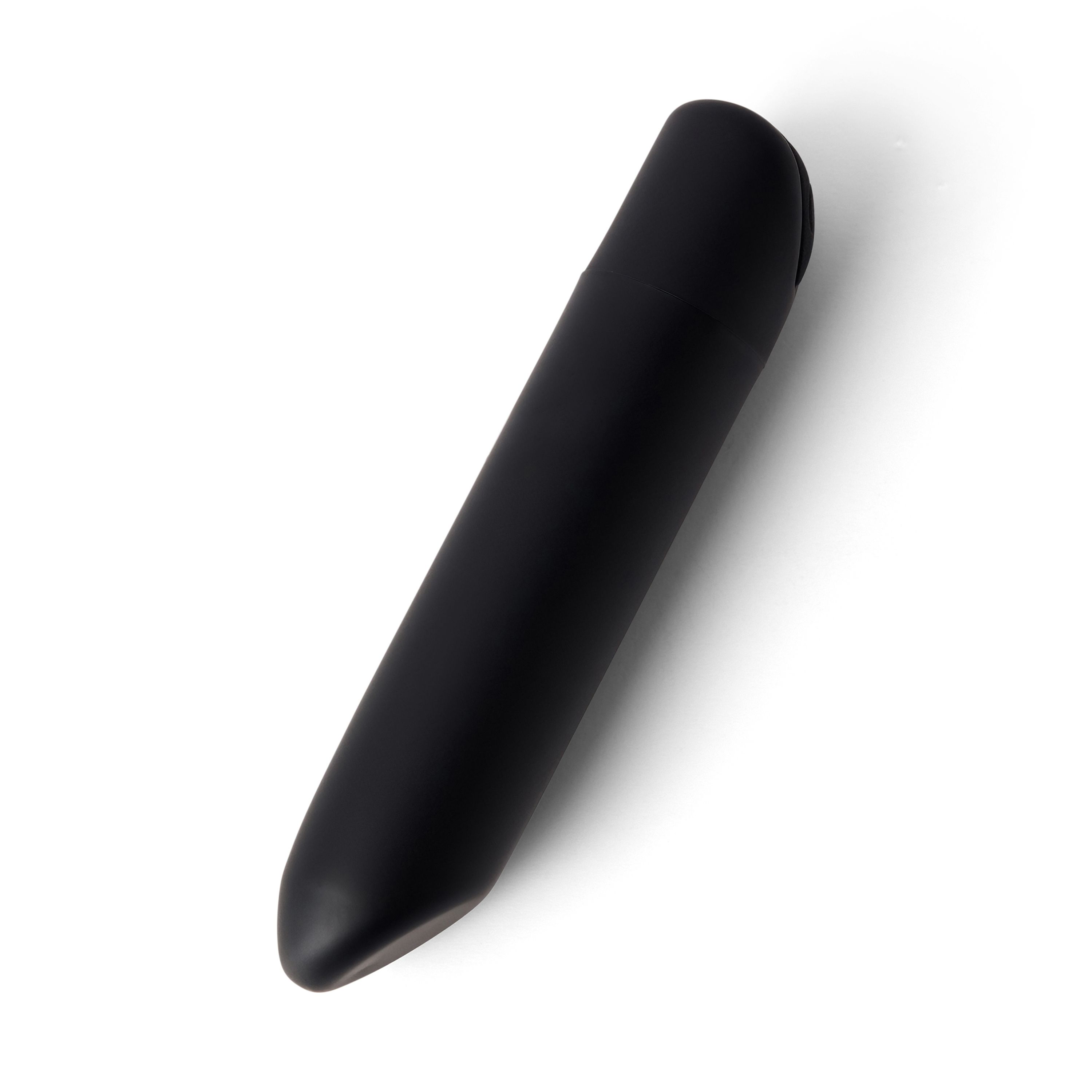 Prodotto benessere nero, cilindrico. Punta arrotondata, superficie liscia. Su sfondo bianco.