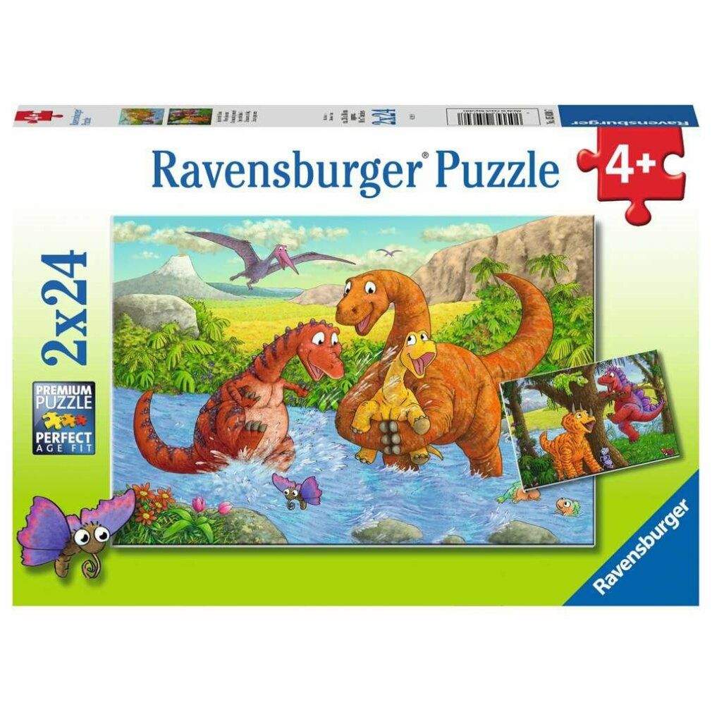 Scatola puzzle con motivo dinosauri. Scritto: Ravensburger Puzzle, 2x24 pezzi, 4+. Immagine: Dinosauri in un paesaggio fluviale.